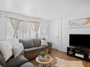Gunnison apartment for rent - living space with large window 