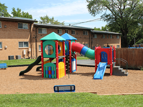 St. Louis apartment for rent - a playground with a slide at Nantucket Gardens Apartments