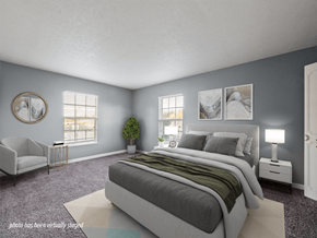 Clarksville townhouse for rent - A bedroom with a large bed and a chair.