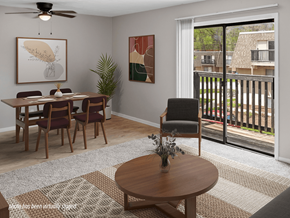 Omaha apartment for rent - A dining room with a table set for four and a view of a balcony.