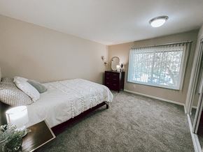 Grand Rapids apartment for rent - a bedroom with a bed and a window