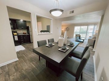 Grand Rapids apartment for rent - a dining room and living room with a table and chairs