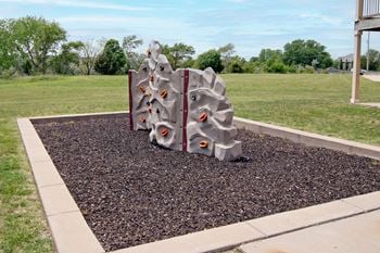 Playground with rock climbing wall