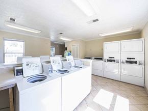 Kettering apartment for rent - a kitchen with lots of white appliances and counters