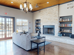 Carlsbad apartment for rent - A living room with a fireplace and a couch.