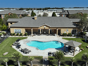 Carlsbad apartment for rent - A large house with a pool in the backyard.