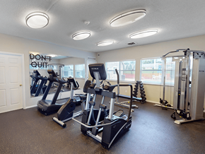 St. Louis apartment for rent - A gym with a sign that says, "Don't Quit."
