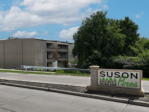 St. Louis apartment for rent - A building with a sign that says  Suson Pines Apartments