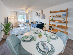 Fayetteville apartment for rent - A dining room with a white table set for six.