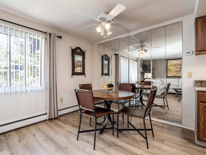 Erie townhouse for rent - A dining room with a table and chairs.