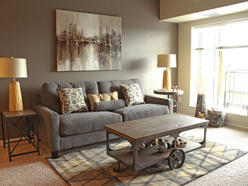 Minot apartment for rent - a living room with a couch and a coffee table