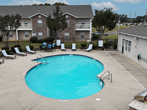 Fayetteville apartment for rent - A small pool with a metal fence around it.