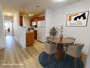 Fayetteville apartment for rent - A kitchen with a dining table and chairs.