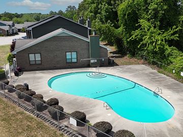 Fayetteville apartment for rent - A swimming pool in front of a house.