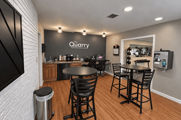 Decatur apartment for rent - A modern dining area with a black table and chairs.
