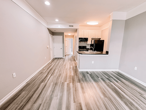 Reynoldsburg apartment for rent - an empty living room and kitchen in a new home