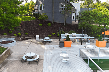 Lakeside seating with umbrellas