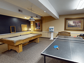 Maryland Heights apartment for rent - A room with a pool table and a ping pong table.