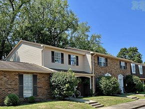 Chillicothe apartment for rent - A residential house with a front yard and a tree.