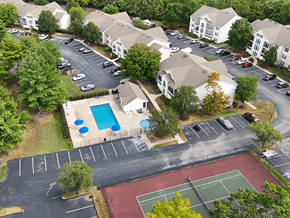 St. Louis townhouse for rent - view of apartment buildings with off street parking