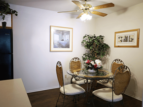 St. Louis townhouse for rent - dining room in apartment with a table and a ceiling fan