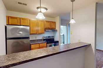 Open kitchen with breakfast bar