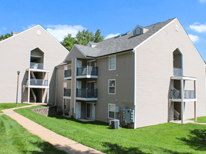 Maryland Heights apartment for rent - Apartment complex with a walkway in front.