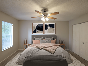 Columbia apartment for rent - a bedroom with a ceiling fan and a bed