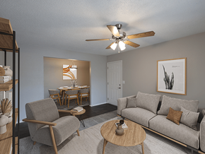 Columbia apartment for rent - an open living room and dining room with a ceiling fan