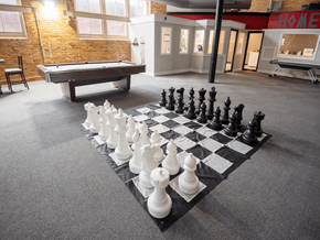 Cleveland townhouse for rent - A giant chess board at apartment community game room