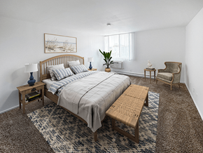 Saint Joseph apartment for rent - a bedroom with a bed and a chair