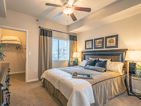 Minot apartment for rent - main apartment bedroom with window and walk-in closet