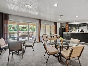 Grandview apartment for rent - a dining room with a glass table and chairs