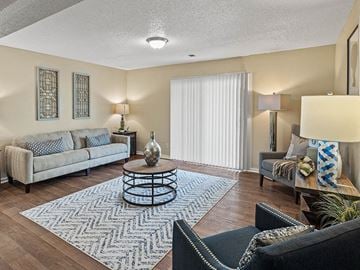 Grandview apartment for rent - a living room with a couch and a table