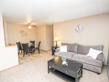 South Sioux City apartment for rent - a living room with a couch and a table