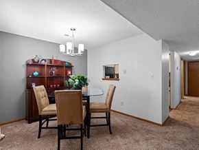 Topeka apartment for rent - a dining room with a table and chairs