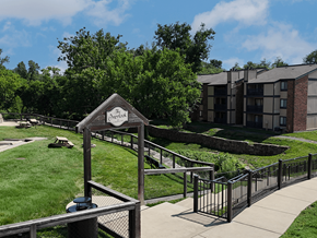 Mehlville townhouse for rent - A sign that says "Overlook" stands in front of a grassy area.
