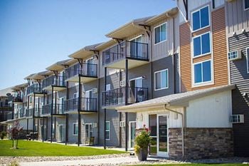 Private recessed walk out balcony (in select homes)