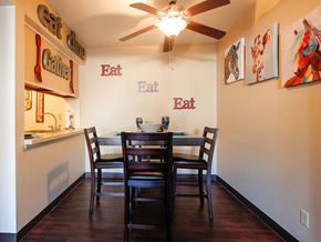 Maryland Heights townhouse for rent - A dining room with a table and chairs.