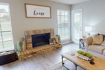 Wood burning fireplace in select units