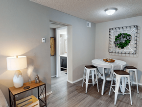 Abilene apartment for rent - A dining room with a white table and chairs.