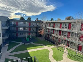 Denver apartment for rent - Outdoor space between buildings at south federal apartments in denver