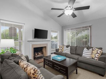 Topeka apartment for rent - a living room with a couch and a tv