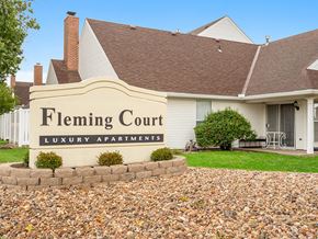 Topeka apartment for rent - a building with a sign that reads flaming court luxury apartments