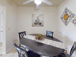 Valley Park apartment for rent - A dining room with a table set for two.