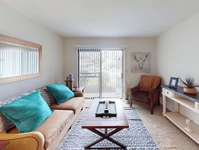 Valley Park apartment for rent - A living room with a couch, chair, and coffee table.