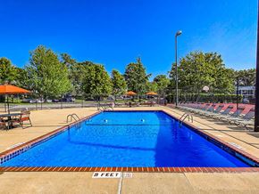Affton apartment for rent - large outdoor pool with chairs around it