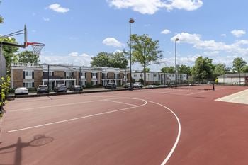 Multi-sport court with basketball hoops