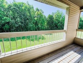 Grand Rapids apartment for rent - balcony overlooking woods at huntington glen apartments