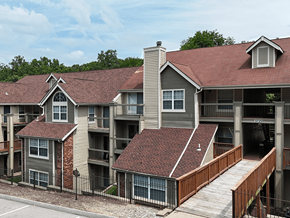 Oakville apartment for rent - Apartment complex with a mix of brick and siding exteriors.